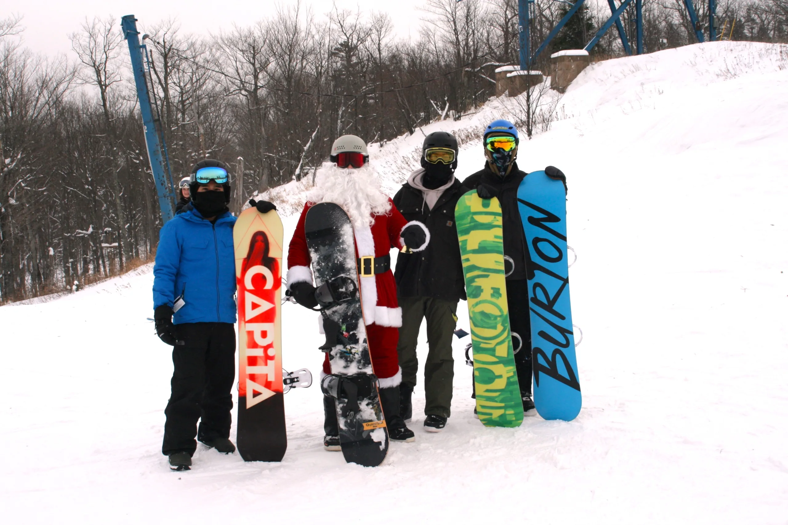 Group of snowboarders on the mountain.