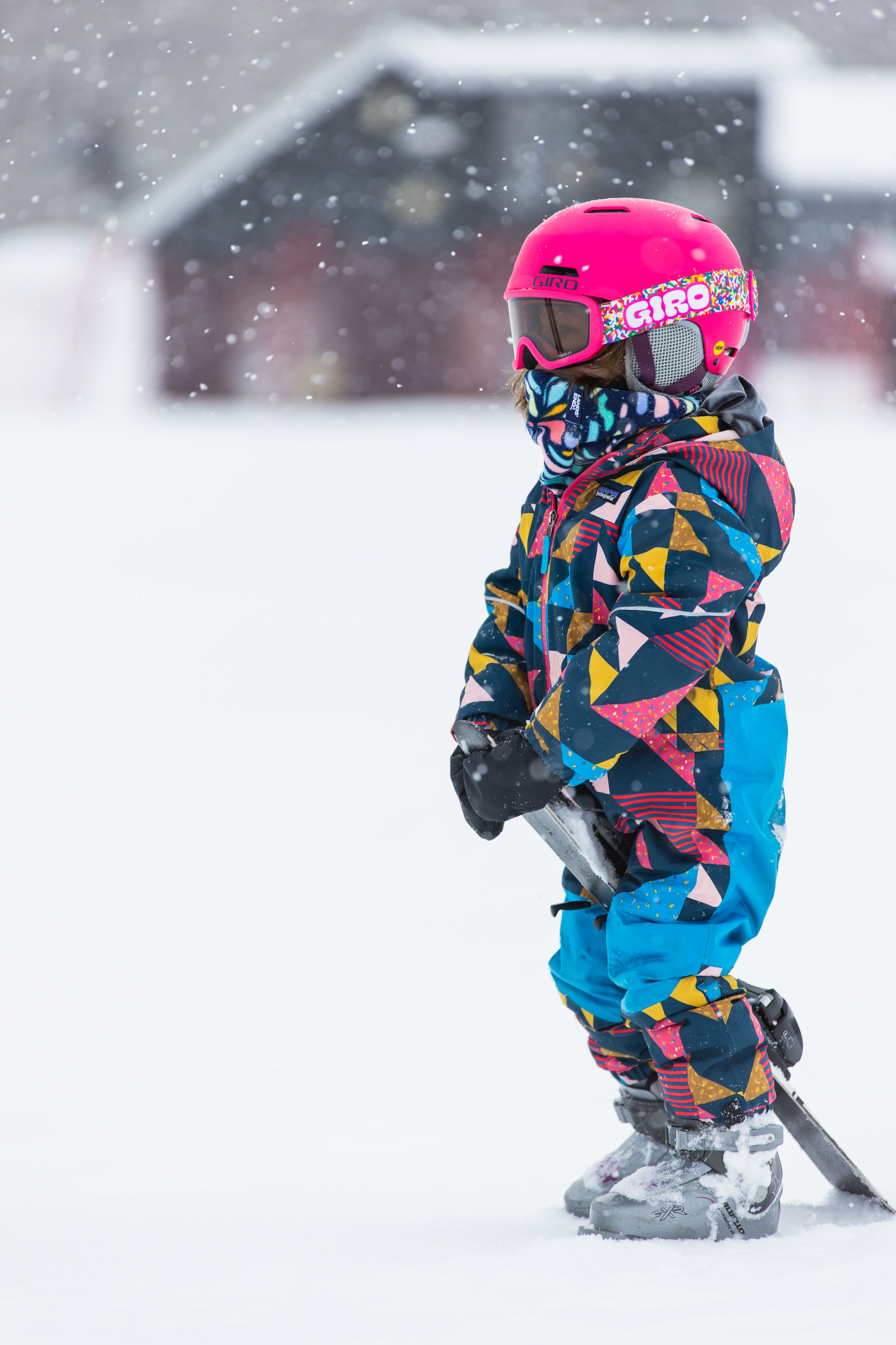 Young child learning to ski.